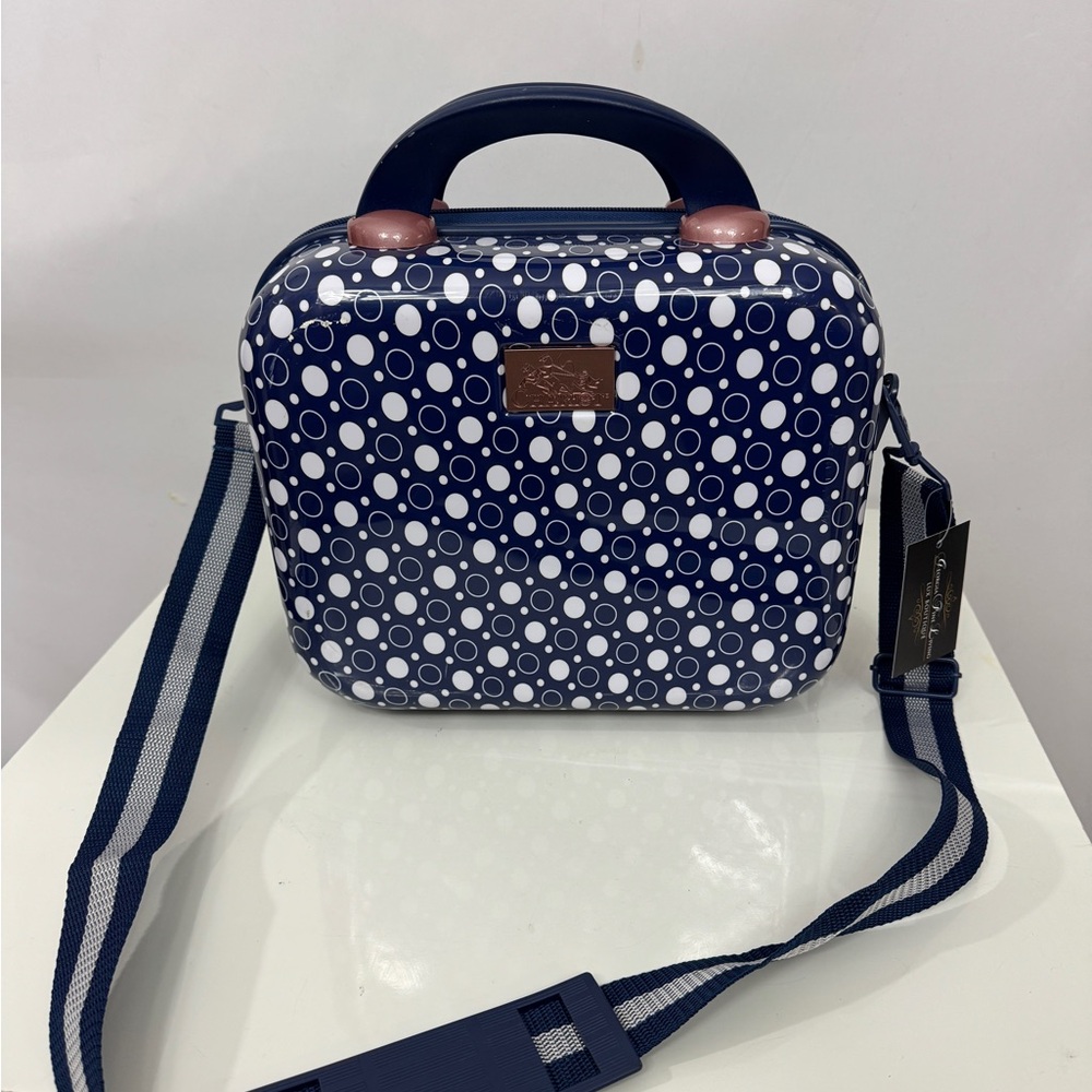 Blue and White Travel Bag with Structured Shape and Detachable Strap